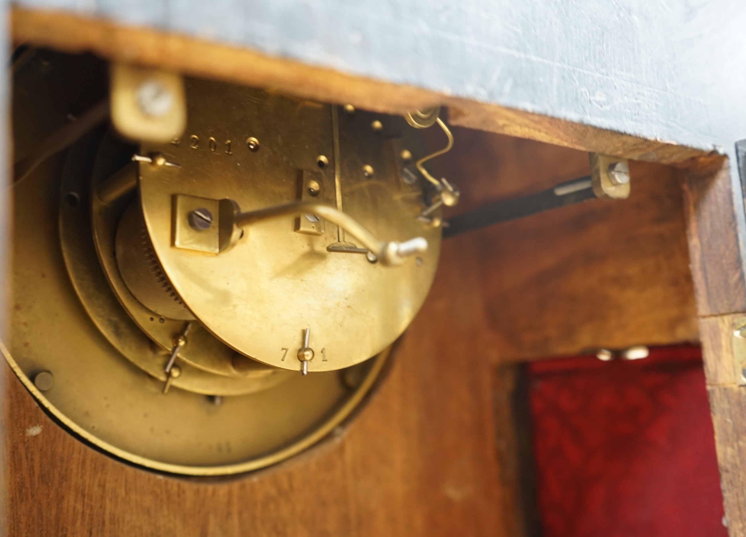 A late 19th century shell inlaid mahogany eight day lancet topped bracket clock, 56cm high. Condition - case good, clock lacking pendulum, untested if working.